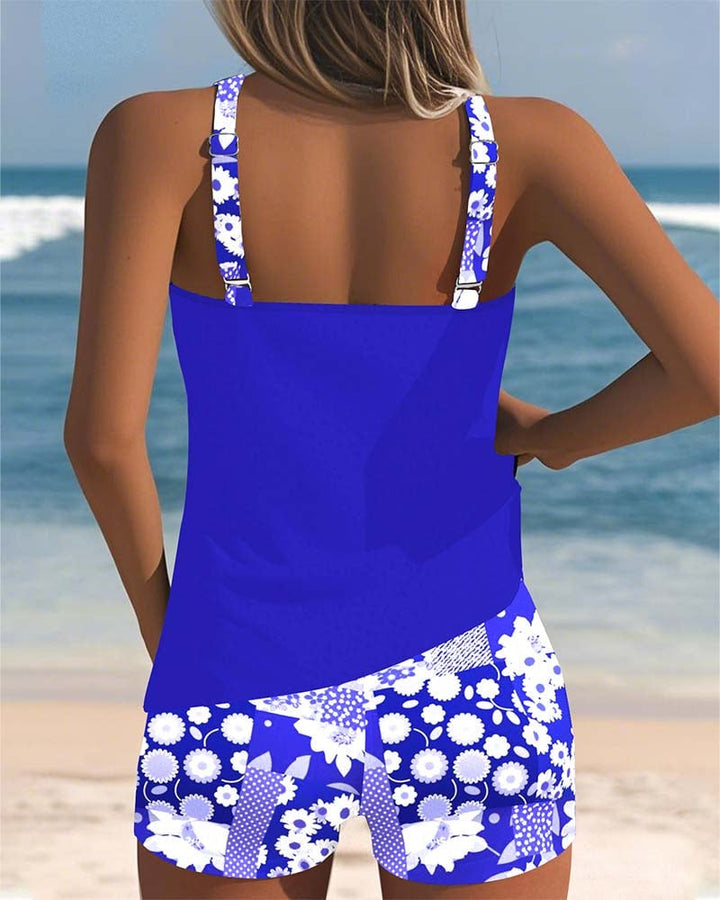 Detail shot of the floral print and waistband on the Melanie swim shorts in pink