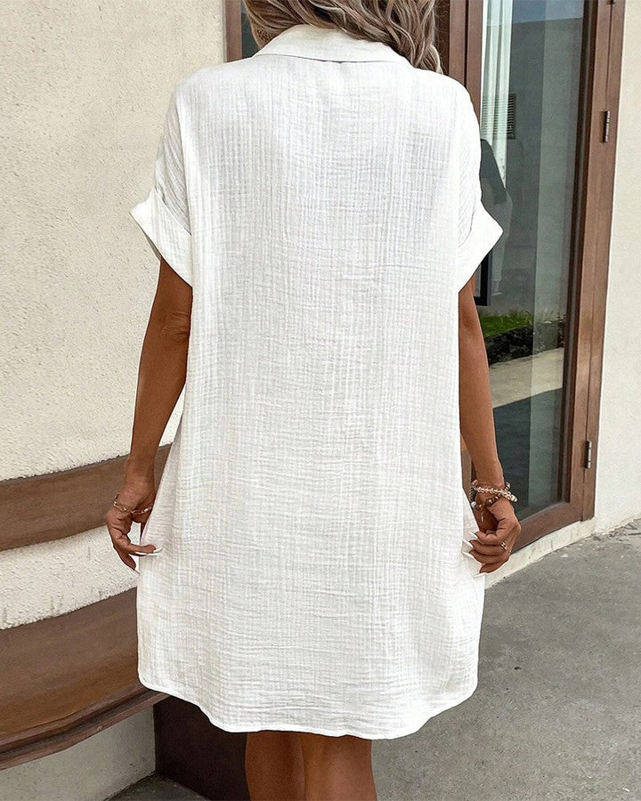 Woman wearing the Melissa summer comfort dress outdoors on a warm sunny day