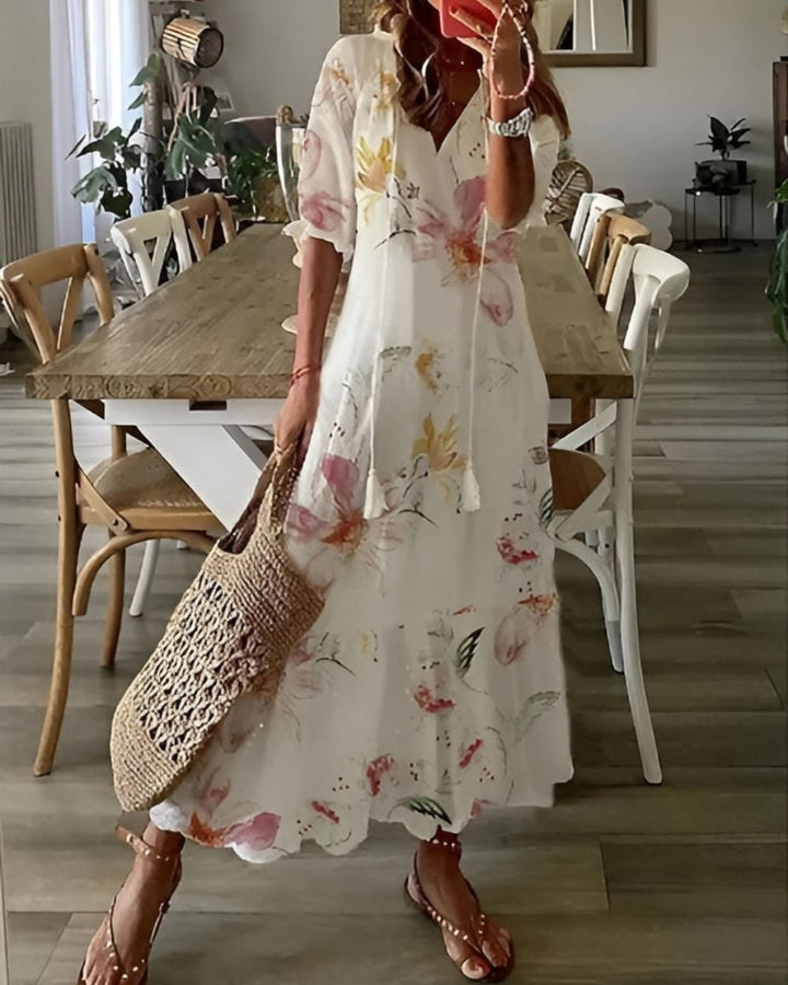 Close-up of the delicate tassel and pattern details on the Boho Magic Covering Dress