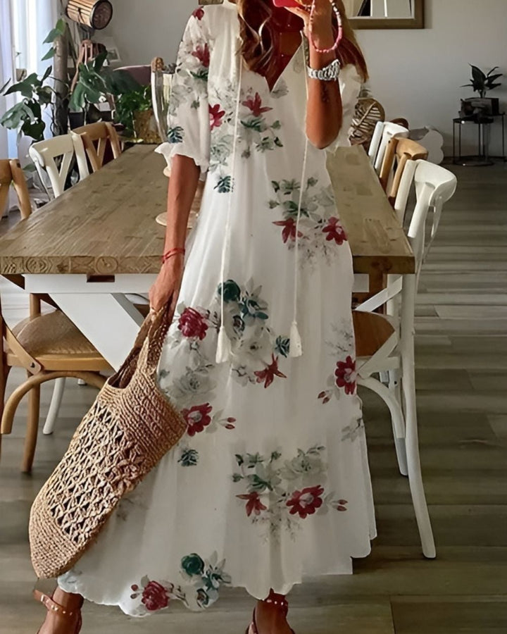 Full-length view of the Boho Magic Covering Dress in white showing its elegant drape