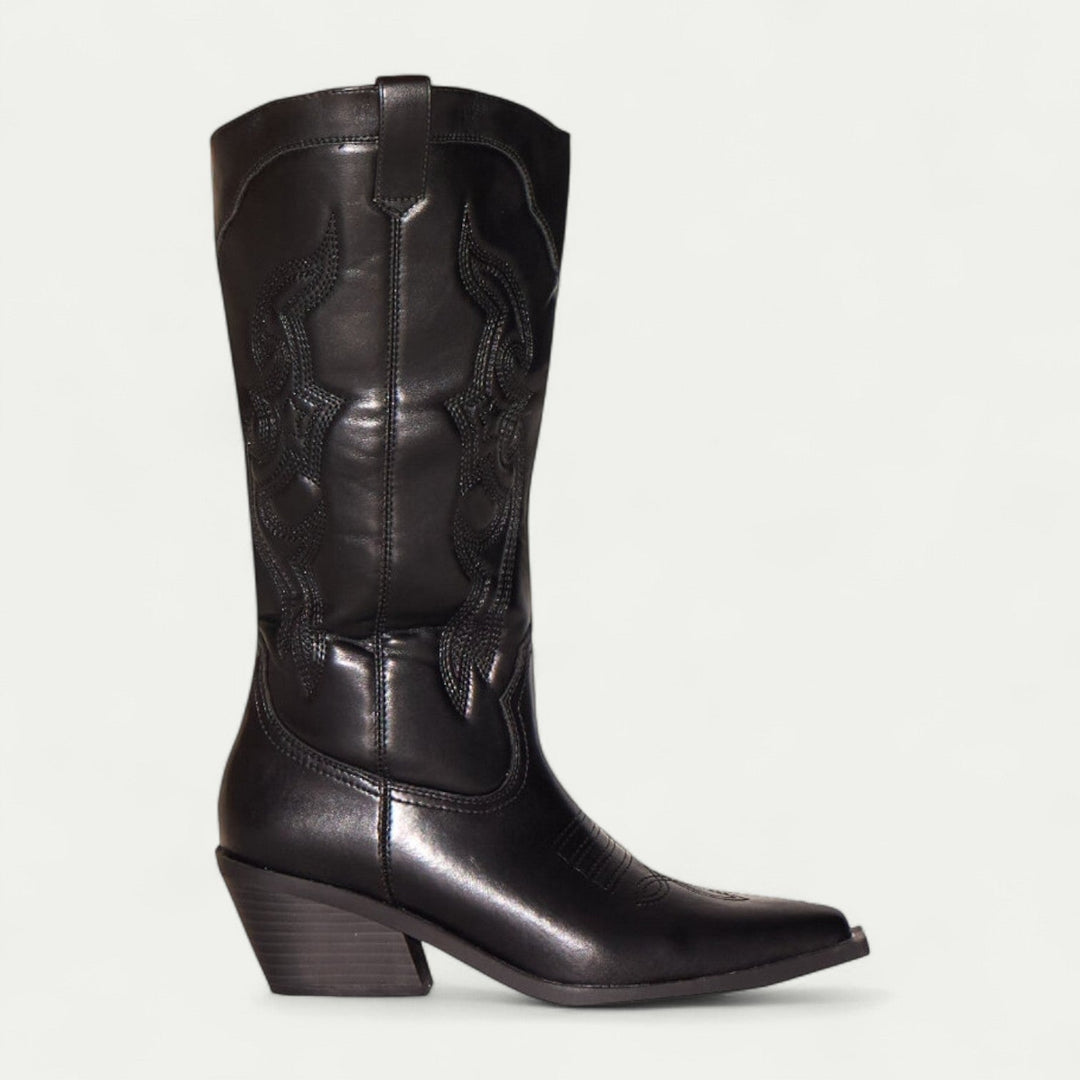 Pair of black and brown western pointed toe calf-high boots side by side