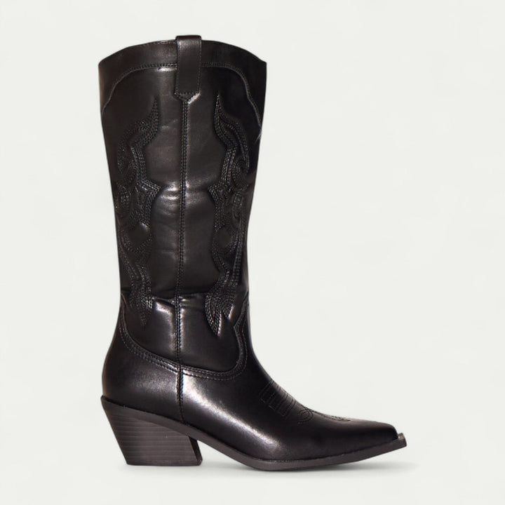 Pair of black and brown western pointed toe calf-high boots side by side