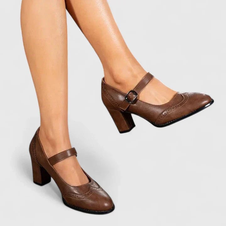 Meredith women's Mary Jane block heel shoes in black with buckle strap and pointed toe, front view