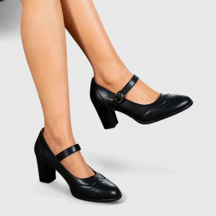 Close-up of Mary Jane buckle strap detail on Meredith block heel shoes in black