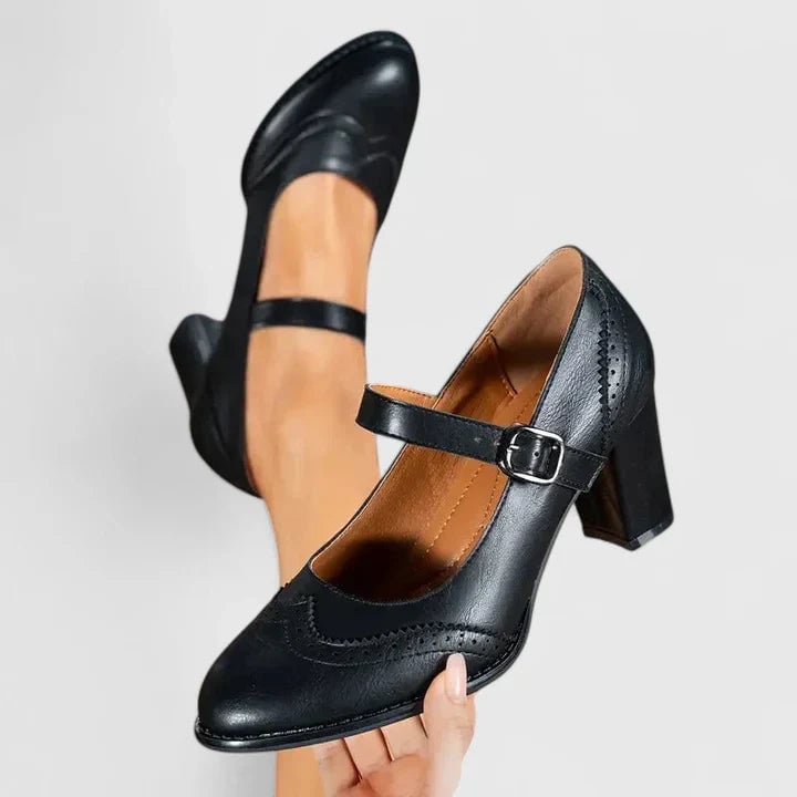 Meredith Mary Jane block heel shoes in black, rear view showing heel height and construction