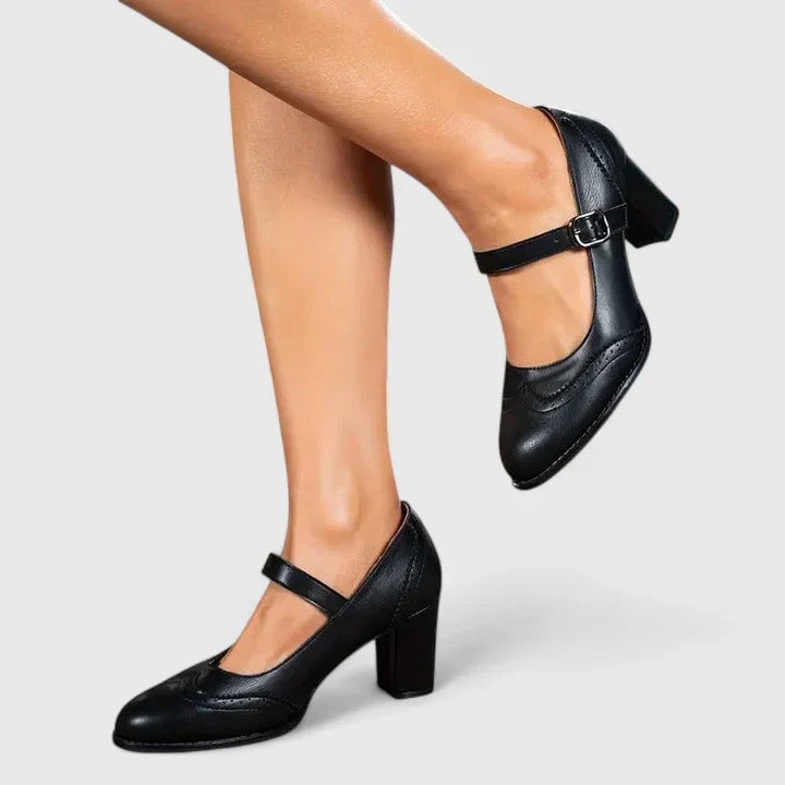 Meredith women's Mary Jane block heel shoes in brown, front view with buckle strap and pointed toe