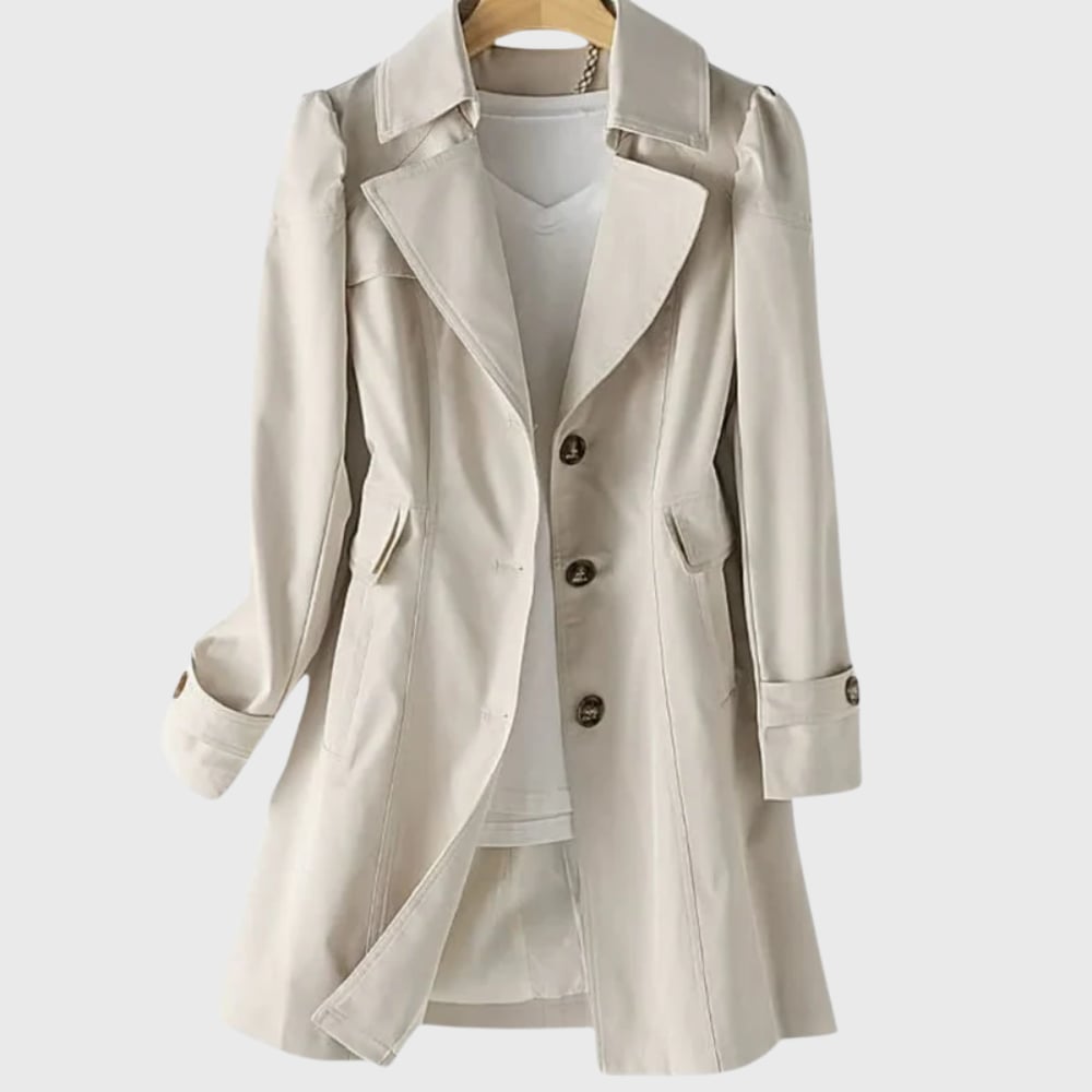 Woman wearing a lightweight water-resistant everyday rain coat in a relaxed tailored fit, shown from the front