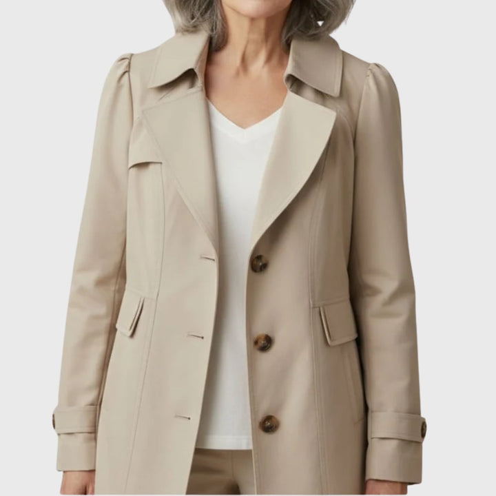 Side view of the everyday rain coat demonstrating ease of movement and streamlined design