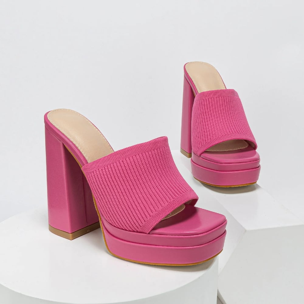 Overhead flat-lay of all five Merle platform sandal color options