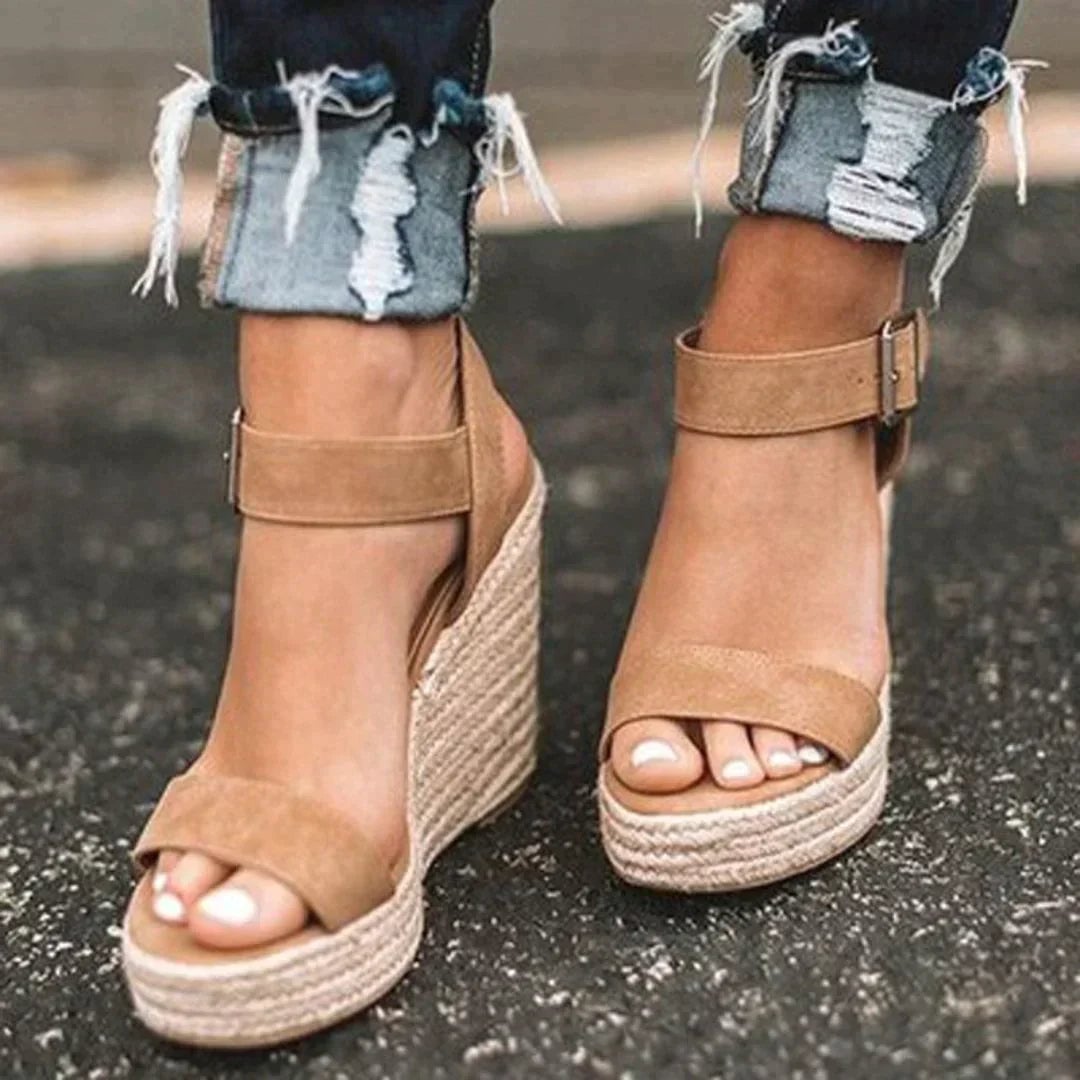 Women's woven espadrille wedge sandals with adjustable buckle ankle strap in brown, side view