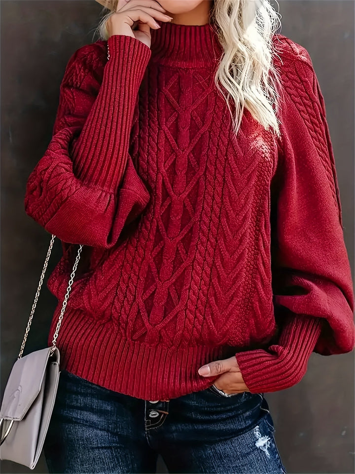 Front view of a casual long sleeve sweater in navy blue with a flattering, easy-fit silhouette