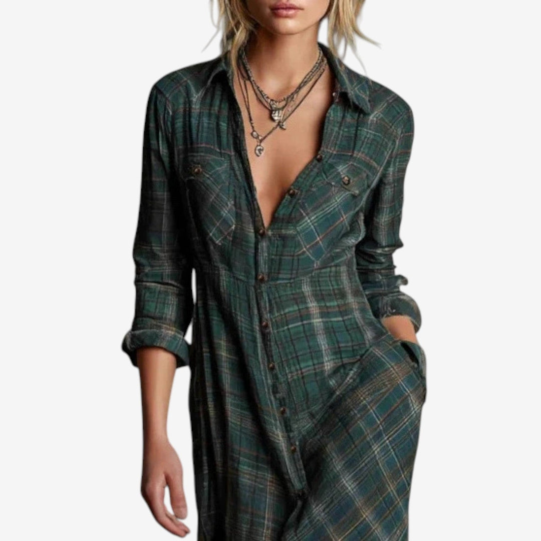 Dark green maxi dress styled for a polished daytime look, three-quarter view