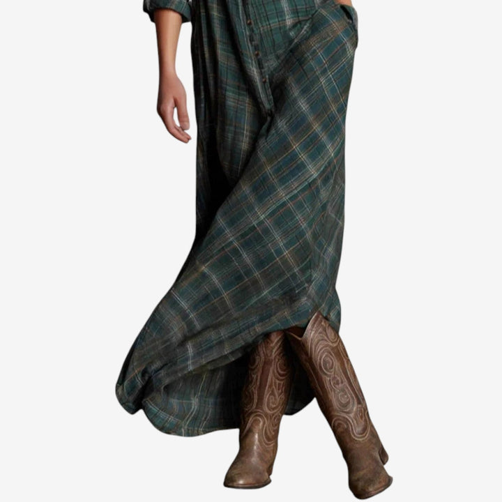 Model in dark green timeless maxi dress showing full-length coverage and elegant fit