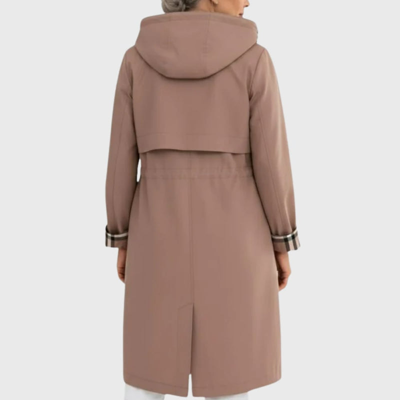 Front view of the Mika lightweight trench coat styled over a casual outfit, shown in black