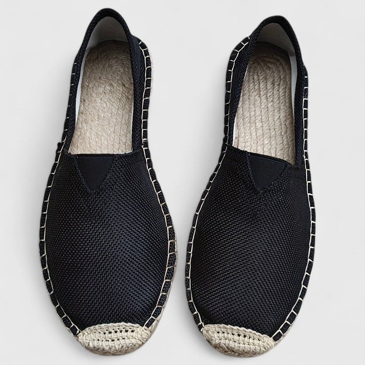 Top-down view of Mila slip-on espadrille flat in white, highlighting open-weave knit mesh construction