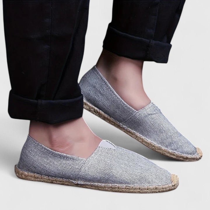 Mila women's espadrille flats in brown, side profile view showing slip-on silhouette