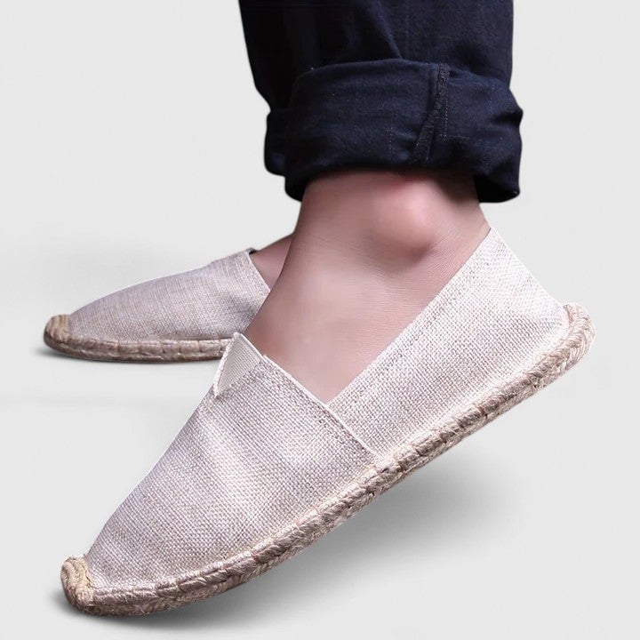 Heel and sole detail of Mila women's espadrille flat showing natural braided jute construction