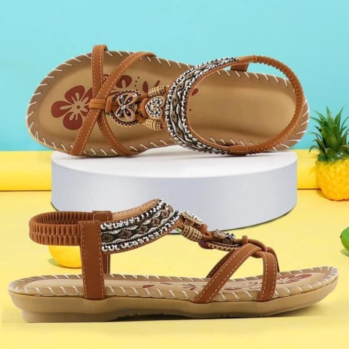 Millicent platform sandals in brown showing cushioned footbed and soft platform sole, side profile view