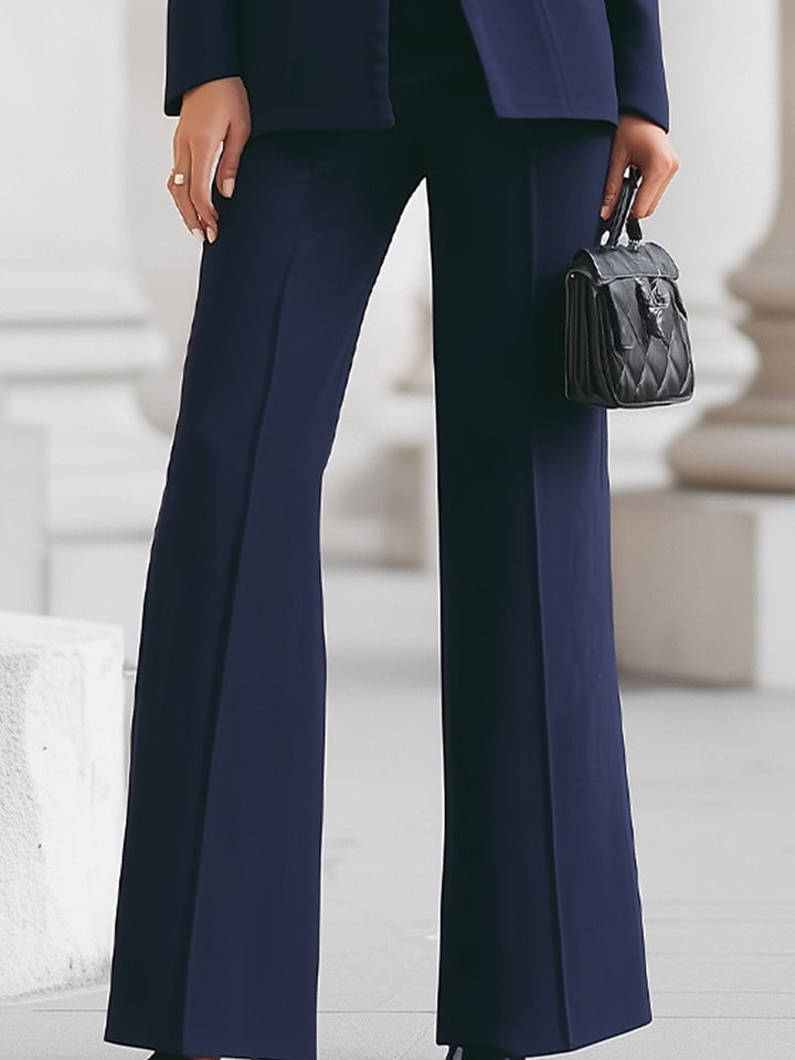 Mirabella two-piece suit set in white with wide-leg pants and structured blazer