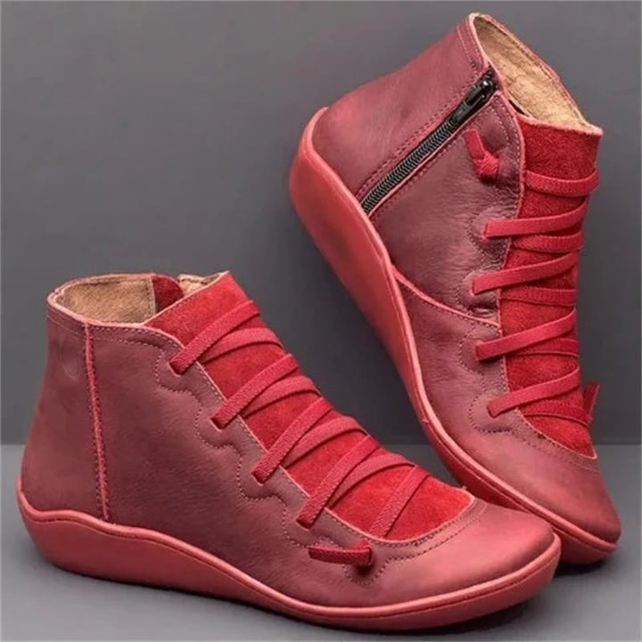 Side view of women's support boot showing stable structured silhouette