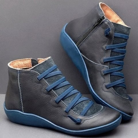 Women's grey support boot close-up showing soft snug collar