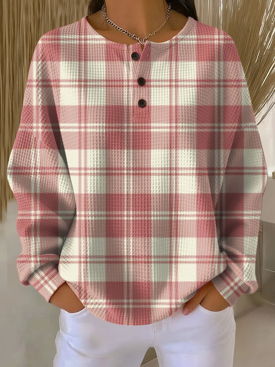 Woman wearing the Molly chic long sleeve sweater in a multicolor relaxed fit style, shown from the front