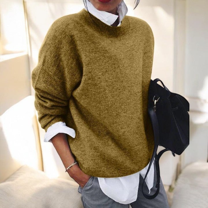 Woman wearing the Molly soft everyday sweater in Gray styled casually for everyday wear