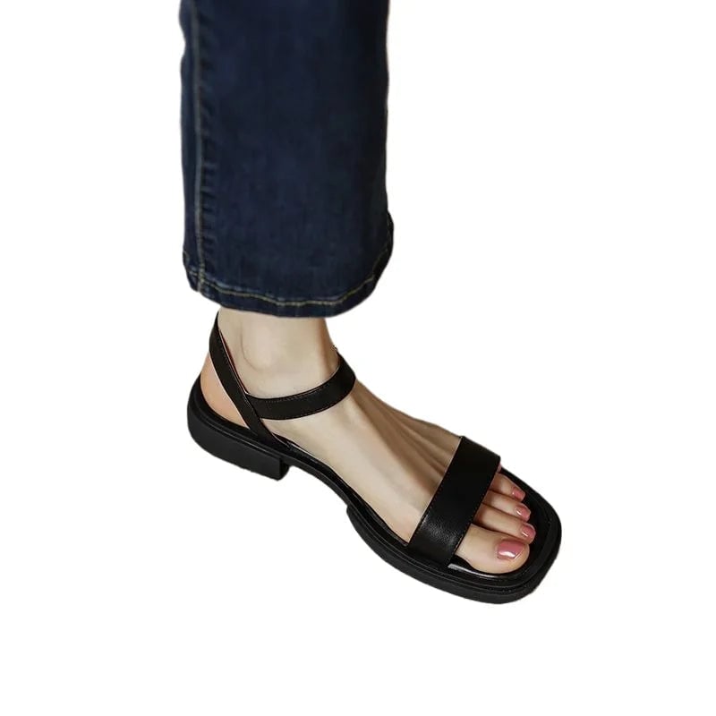 Close-up of the padded insole and adjustable ankle strap detail on the Molly sandal
