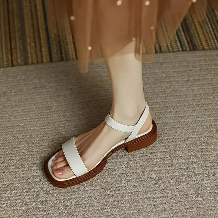 Molly sandal in brown worn on foot showing low block heel and comfortable fit