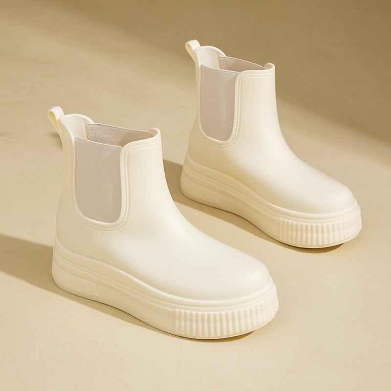 Close-up of Mona rain boots showing subtle detailing and flexible construction