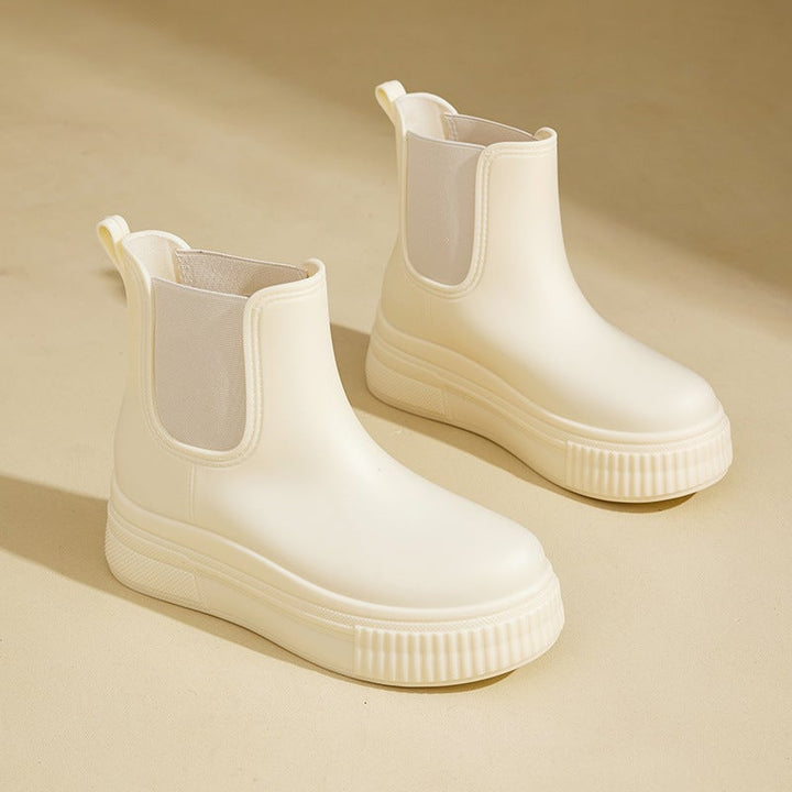 Close-up of Mona rain boots showing subtle detailing and flexible construction
