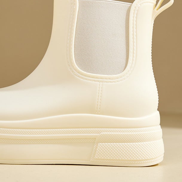 Top-down view of Mona rain boots showing the opening and interior