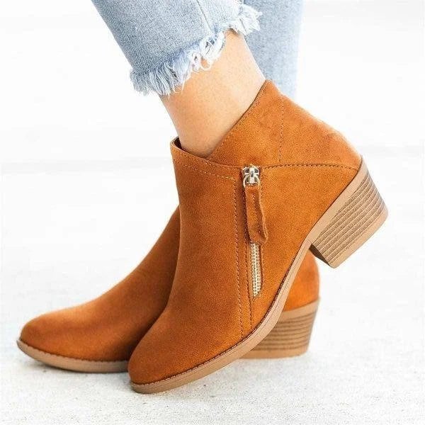Side view of Mona low-heel ankle boots showing smooth zipper detail