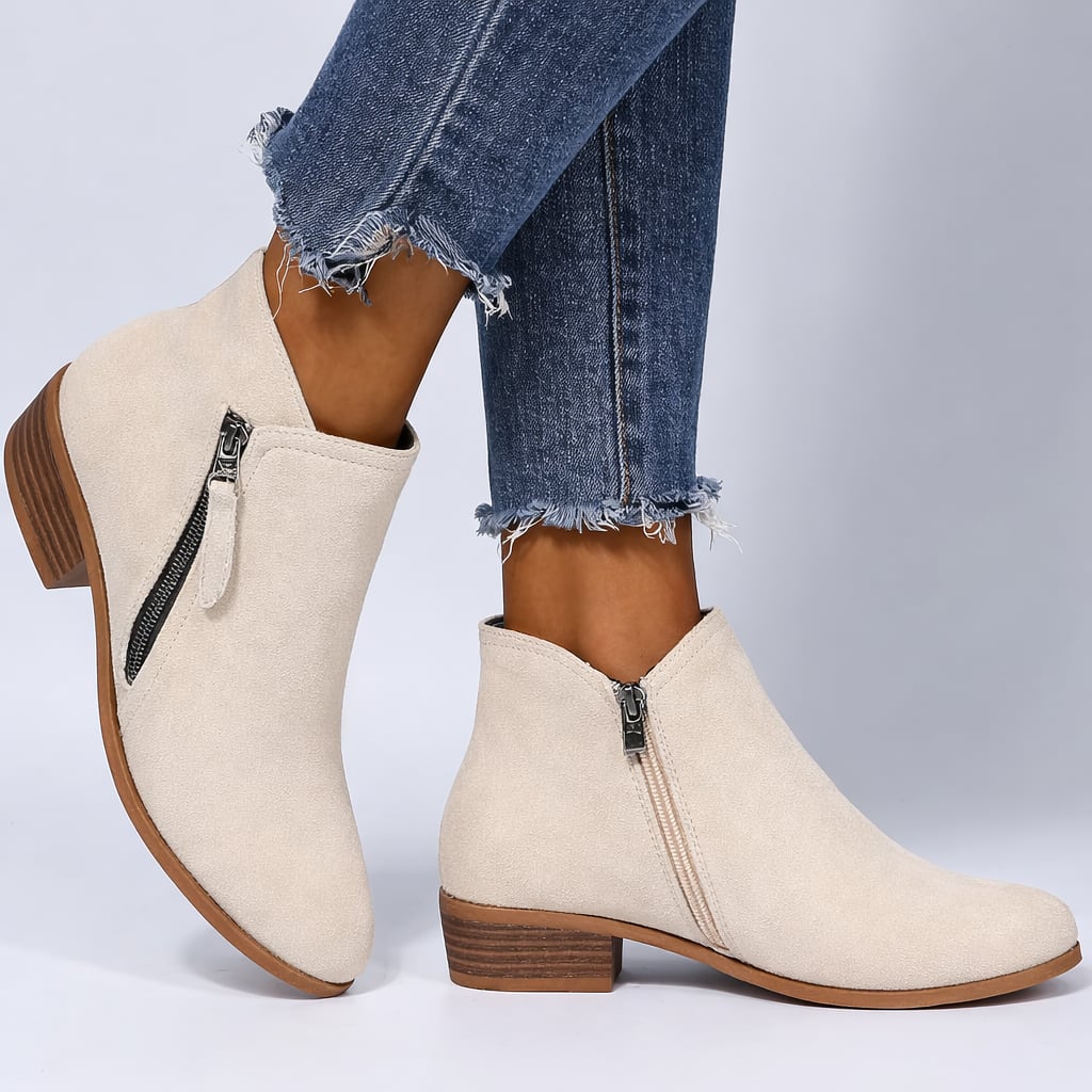 Close-up of cushioned interior and side-zip on Mona women's ankle boots