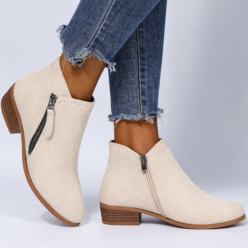 Close-up of cushioned interior and side-zip on Mona women's ankle boots
