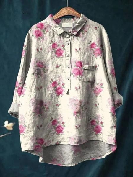 Model pairing floral blouse with white jeans and flat sandals for a casual look