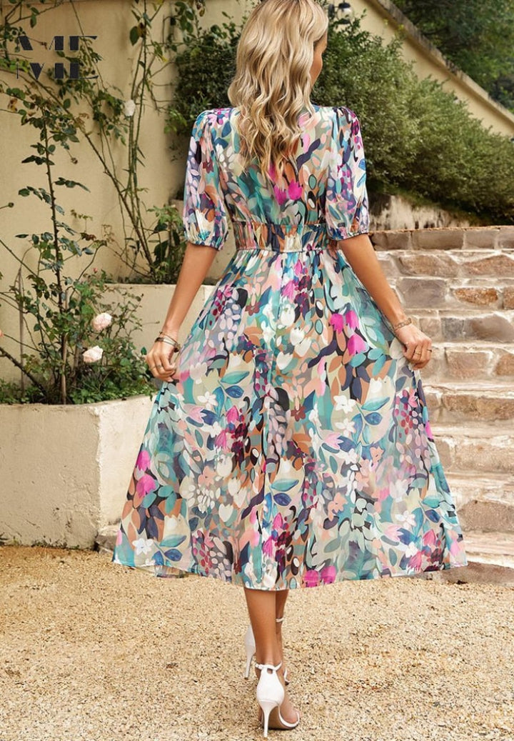 Front view of the Monica floral dress showing delicate botanical pattern and lightweight fabric