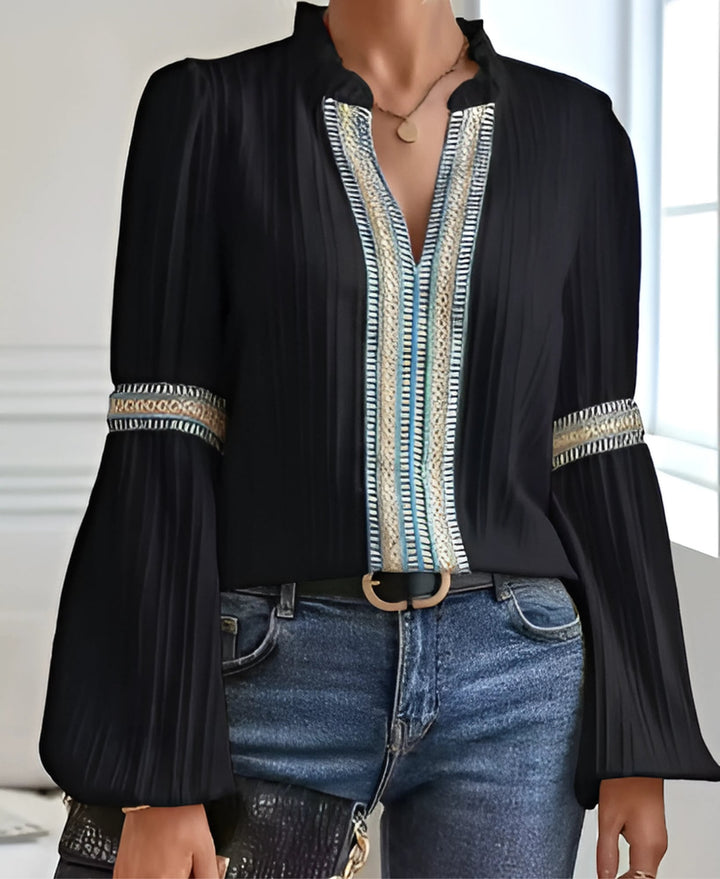 Woman wearing a green vintage blouse casually paired with jeans