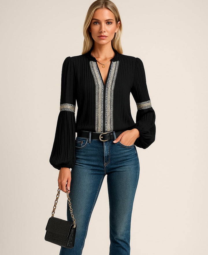 Side view of a flowing vintage V-neck blouse in black showing relaxed silhouette