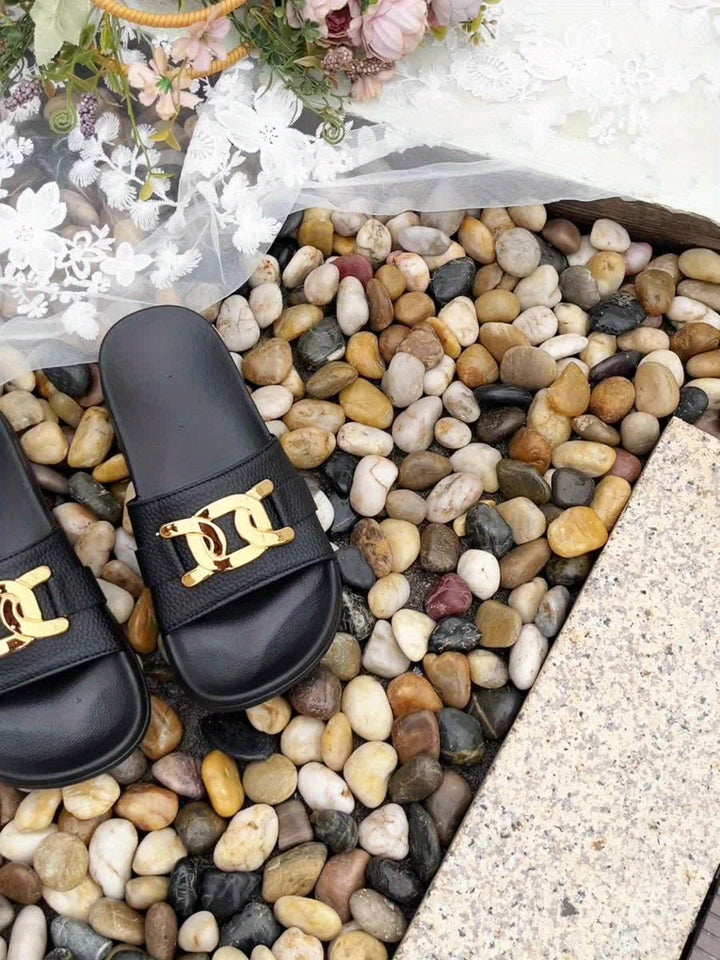 Monroe black sandal heel and sole detail showing supportive construction