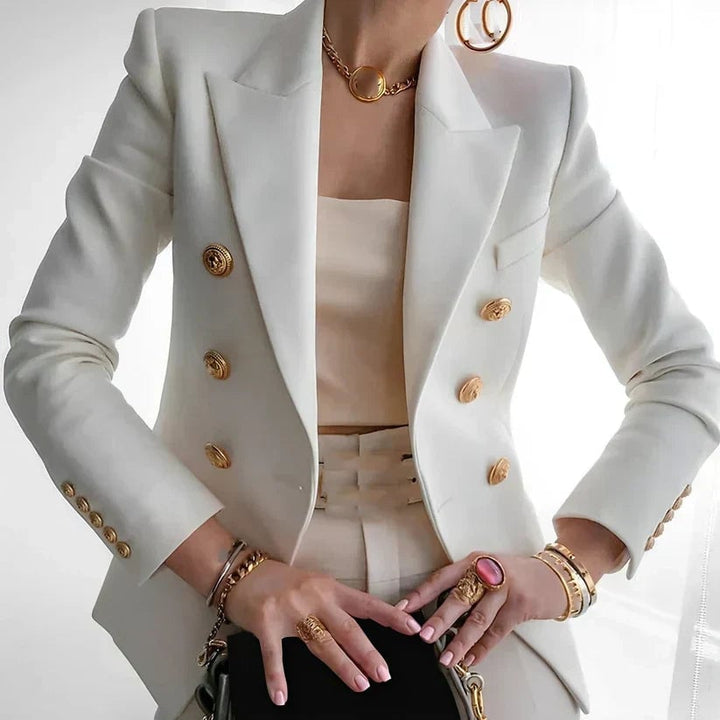 Front view of the Monroe double-breasted blazer showing double rows of embossed gold buttons