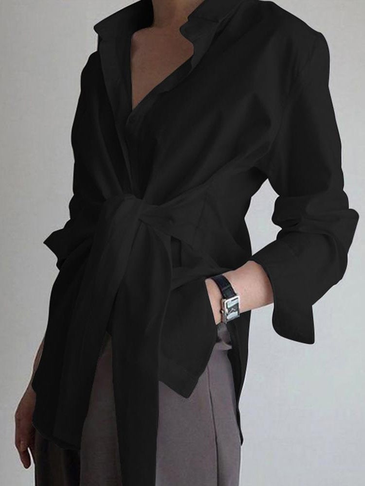 Front view of the Monroe blouse in white showing structured collar and full-length sleeves