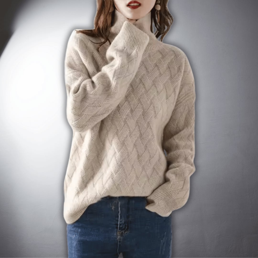 Front view of model in a light beige oversized sweater styled with casual bottoms