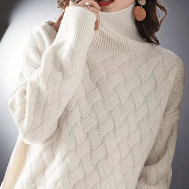 Side view of oversized sweater in off white highlighting the loose, draping fit