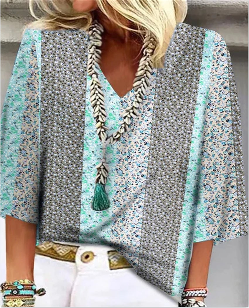 Front view of the Mosaic floral patchwork top showing soft grey, powder blue, and blush pink vertical panel design
