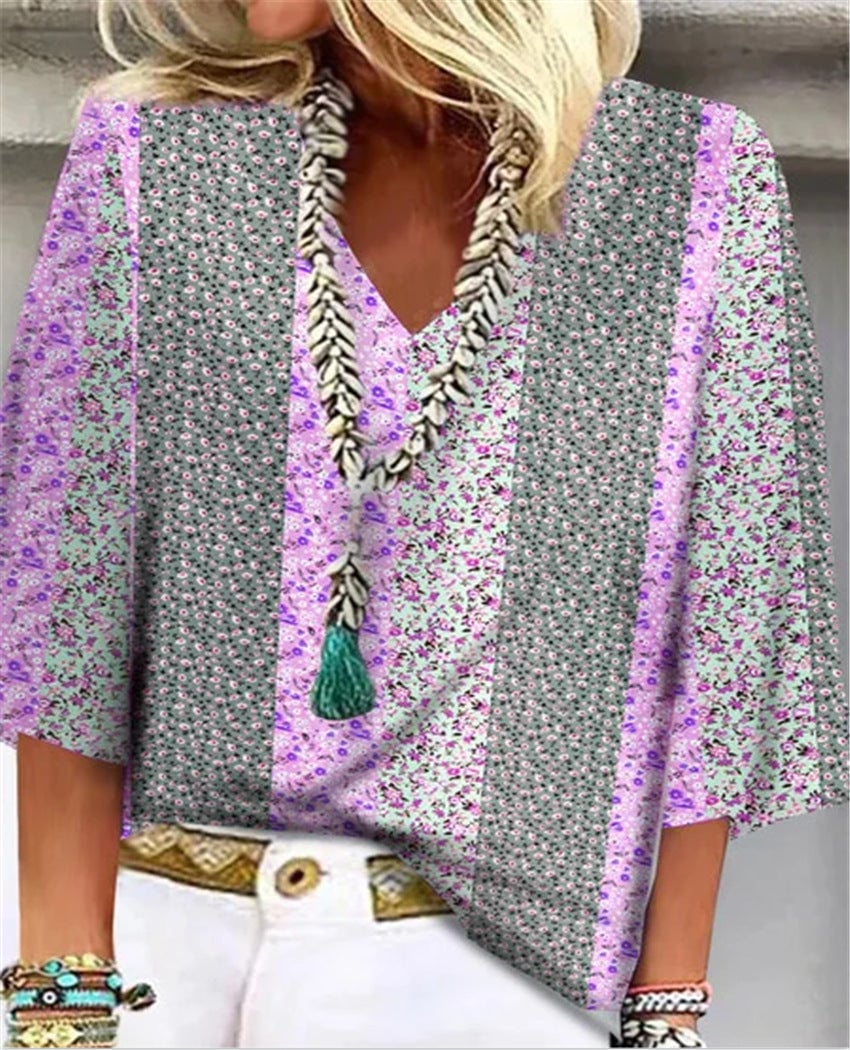 Close-up detail of the Mosaic top's coordinating ditsy floral prints in colorblock patchwork panels