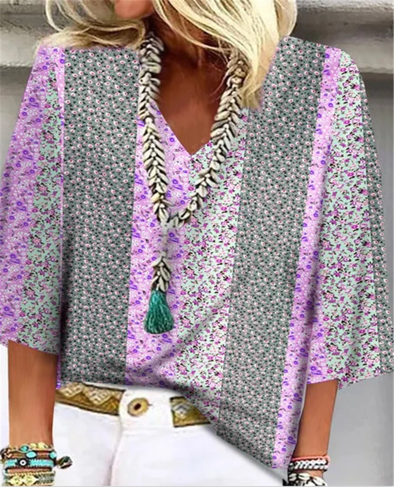 Close-up detail of the Mosaic top's coordinating ditsy floral prints in colorblock patchwork panels