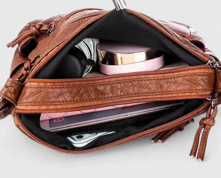 Lifestyle shot of the Mykahlynn elegant structured handbag styled with a casual daytime outfit