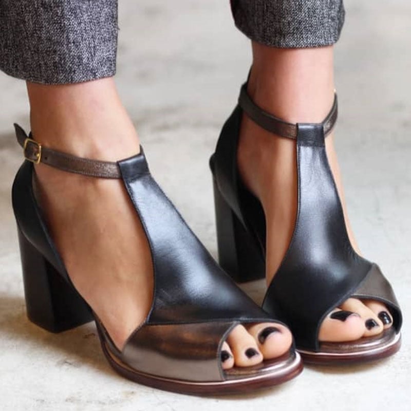 Black patchwork peep toe block heels with ankle strap, front view showing contrast panel detailing