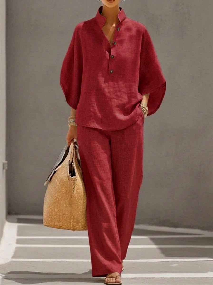 Flat lay of the Nadia red two-piece set displaying both the top and wide-leg pants side by side